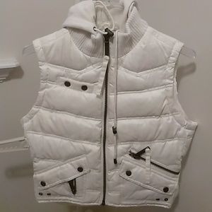 Ivory puffer sleeveless hoodie jacket.